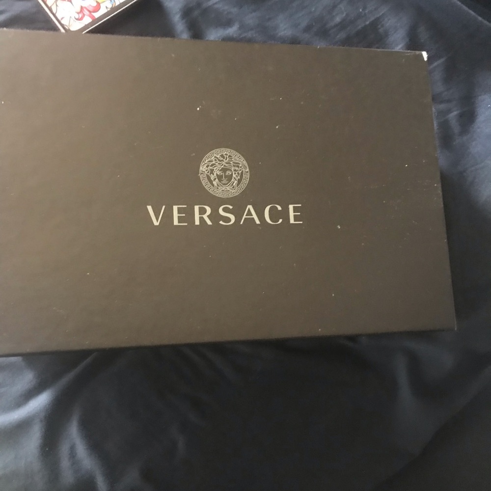I’m selling my Versace sandals new never worn feet to fat for them lol